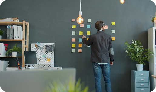 Professional planning relocation and downsizing strategy using notes on a planning board - Gordon's Downsizing